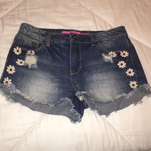 Denim shorts with floral detailing